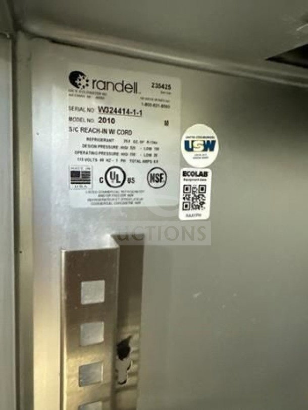 Randell 2010 commercial refrigerator label showing serial number, UL and NSF certifications, and operational details.
