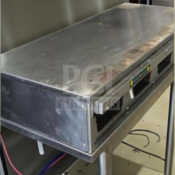 Stainless steel Duke FWM3-14-208 heated holding cabinet, superior condition, 208V, fully tested, top surface visible.