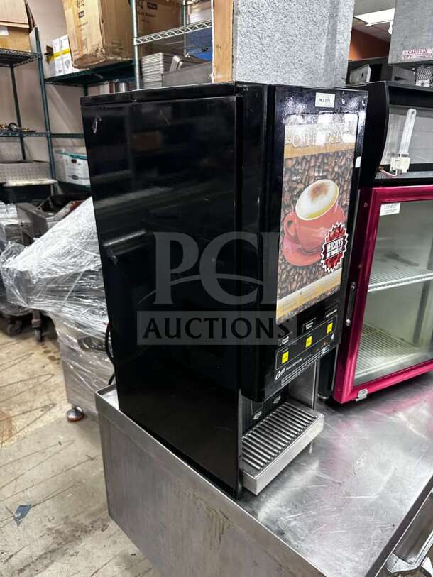 Wilbur Curtis PC-3D-10-01 commercial cappuccino dispenser, 3 flavor stations, 120V, in exceptional condition, fully tested.