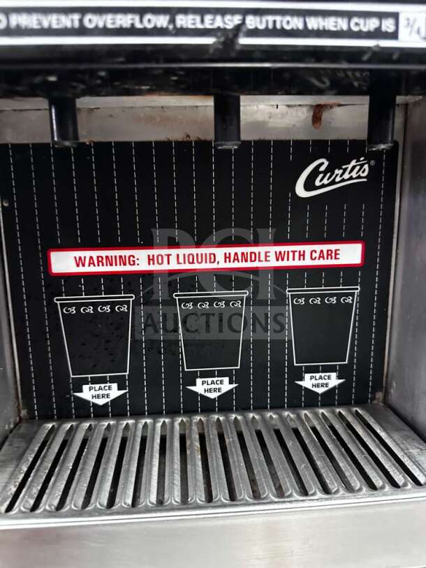 Wilbur Curtis PC-3D-10-01 cappuccino dispenser with 3 flavor stations, 120V, warning label, excellent condition.