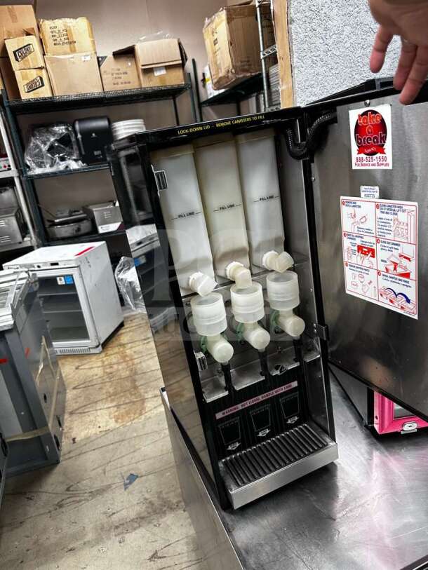 Wilbur Curtis PC-3D-10-01 commercial cappuccino dispenser with 3 flavor stations, in exceptional condition, fully tested.
