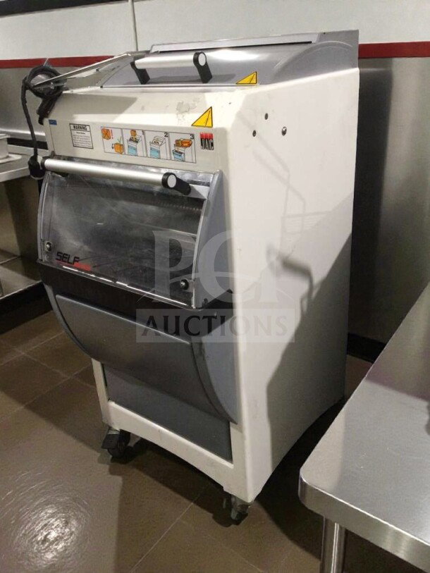 JAC KG-12FS commercial bread slicer in refined condition, 115V, fully tested and working, with visible control labels.