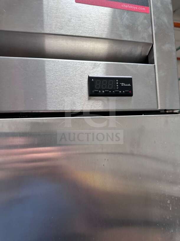 True T-23F-HC reach-in freezer, 23 cu. ft., stainless steel, flawless. Digital display, model tag visible, fully operational.