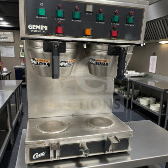 Wilbur Curtis GEM312IL coffee brewer, high-grade condition, 120V, dual warmers, control panel, caution labels visible.