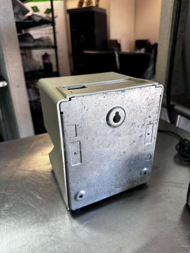 AMANO TCX-11 Time Clock Recorder, automatic employee time stamp, prime condition, fully tested, model 5477, key slot shown.