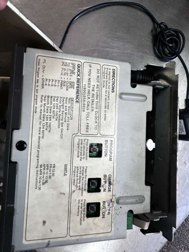 AMANO TCX-11 Time Clock Recorder, model 5477. Features programming buttons with clear instructions. Fully tested.