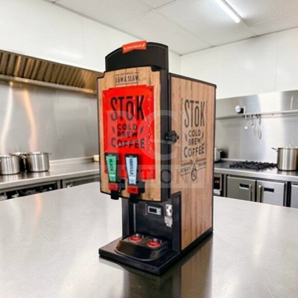 CreaMiser Model 230 cold brew dispenser, dual tap, exceptional condition, Stōk branding, fully operational, commercial use.