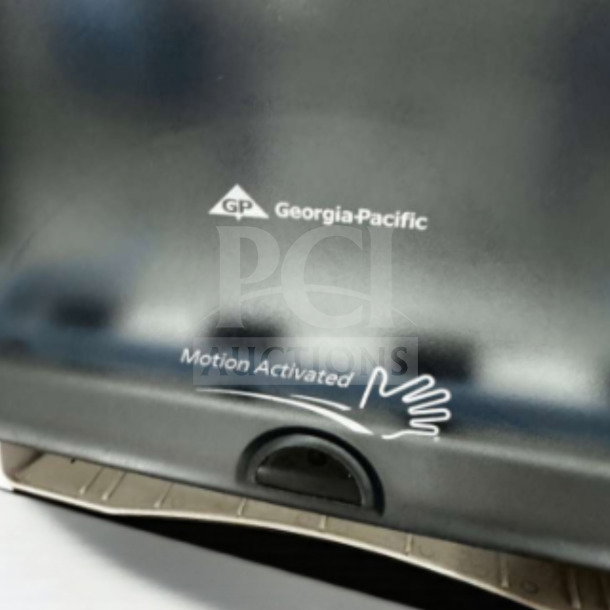 Georgia-Pacific enMotion 59462A touchless paper towel dispenser in black, motion activated, excellent condition, inspected.