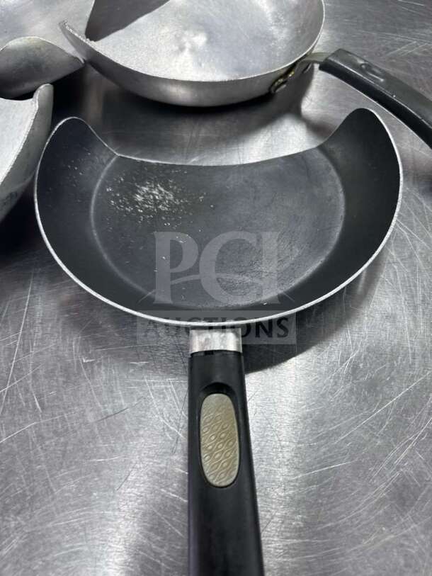 Oster Nonstick Wok/Stir-Fry Pan Set, quantity 4, well-maintained, commercial use, fully inspected, black handles.