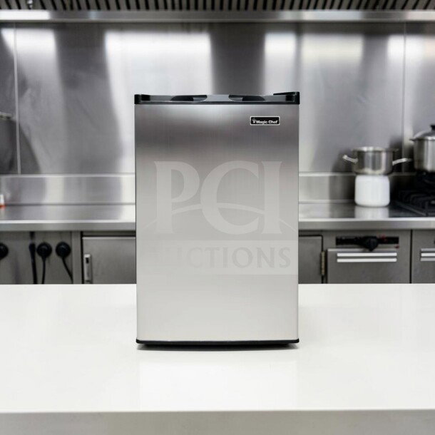 Magic Chef MCUF3S2 3 Cu. Ft. Compact Upright Refrigerator, stainless steel, excellent condition, fully tested, space-saving design.