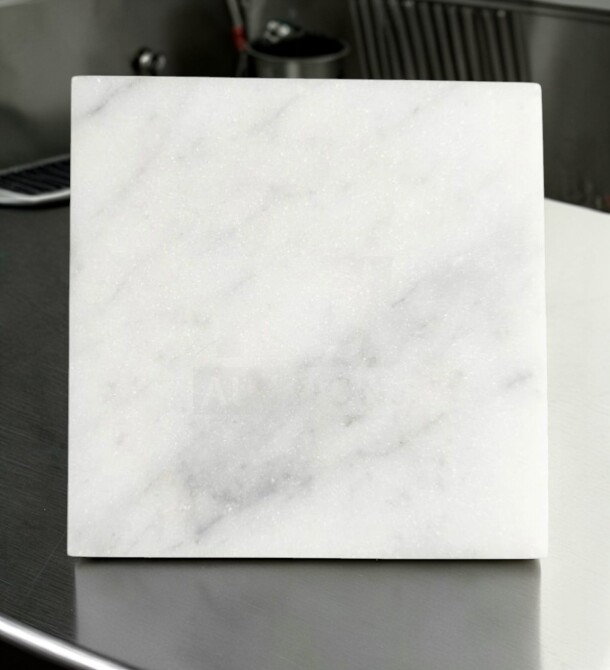 Carrara Marble honed 4x4 tile in outstanding condition, natural stone with white and gray veining, ideal for interiors.