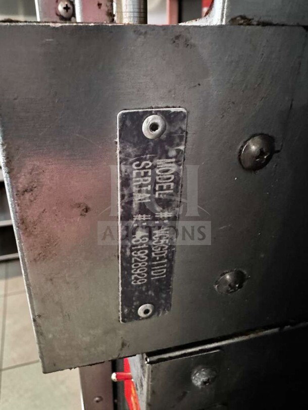 Metal label on Vulcan VC55GD double stack convection oven, showing model and serial number, indicating authenticity.