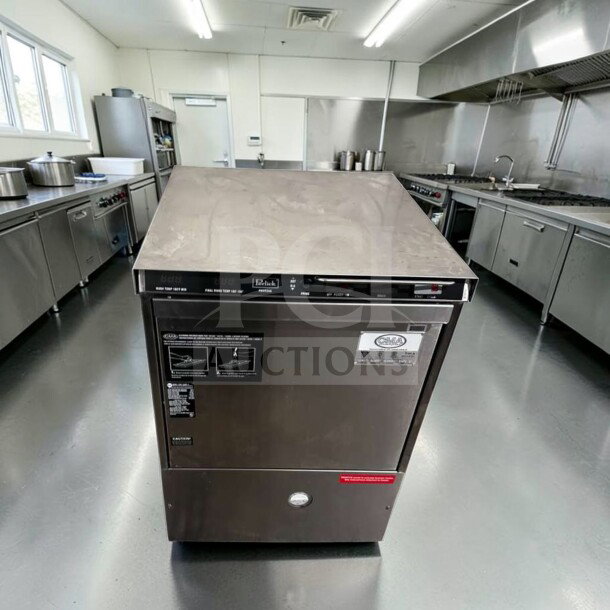 Flawless Perlick PKHT24 glasswasher, 24” wide, high-temp, door type, 30 racks/hour, fully tested, operational, in a commercial kitchen.