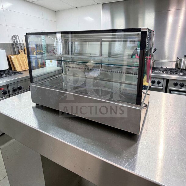 RPI VICD3-20-R-SQ-SC-CT refrigerated display case, glass merchandiser in immaculate condition, 115V, commercial grade.