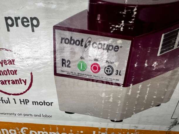 Robot Coupe R2N commercial food processor, features 3L capacity, on/off/pulse controls, prime condition, one-year motor warranty.