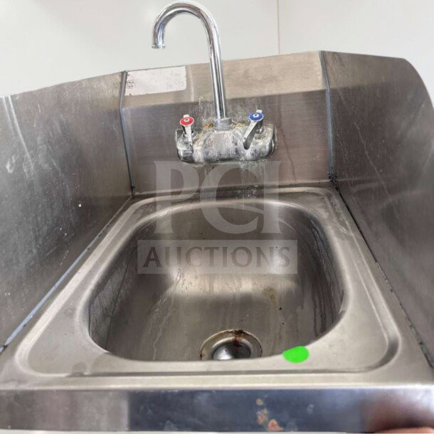 Krowne HS-9L wall mount hand sink, 9 3/4" x 11 3/4" bowl, low lead faucet, NSF certified, stainless steel, pristine condition.