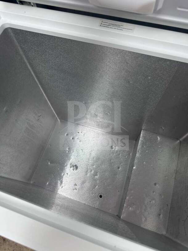 Vissani DCM7QRBWW commercial chest freezer, 7 cu. ft., excellent condition, UL listed, fully tested, interior view.