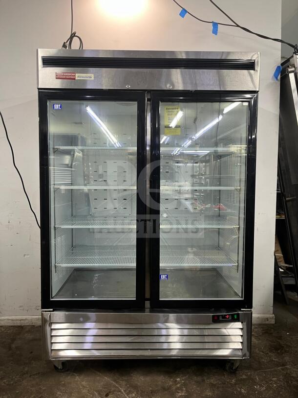 NORTH AMERICAN Precision Series A2GDF double glass door merchandiser freezer, stainless steel, shelves visible, excellent condition.