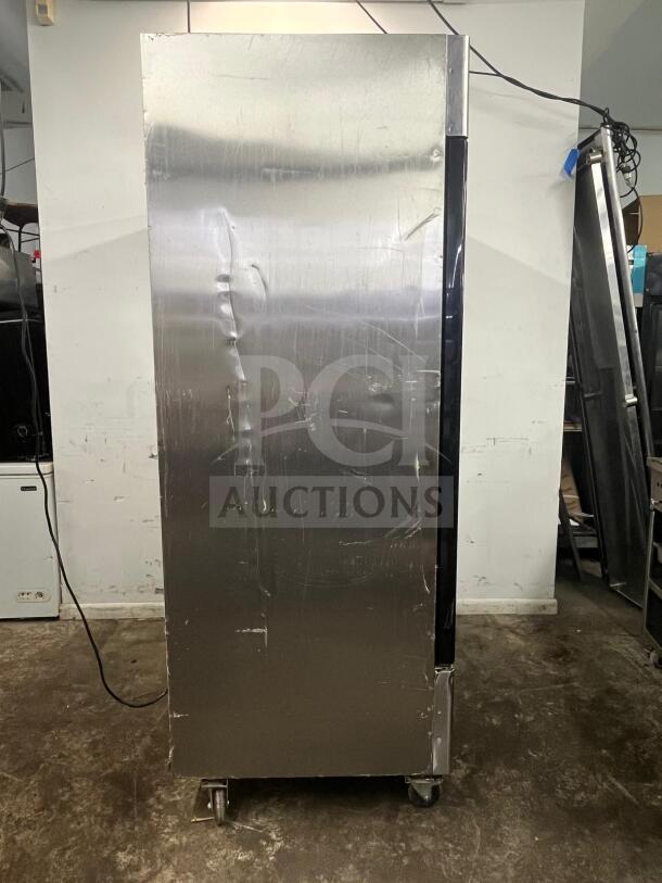 NORTH AMERICAN A2GDF double glass door merchandiser freezer; silver finish; visible wear; on wheels.