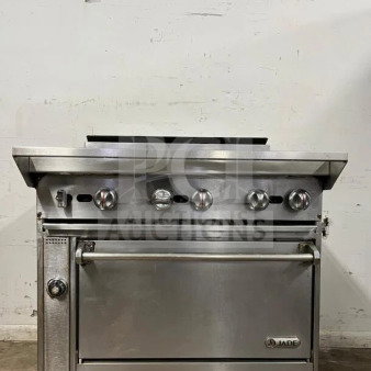 Jade Range Oven, 6 burners, 35000 BTU, stainless steel, front control knobs, oven door, Jade logo, good condition.