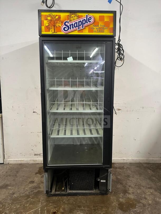 TRUE GDM-19T-LD 27" black glass door merchandiser with LED lighting, Snapple branding, includes travel case, used condition.