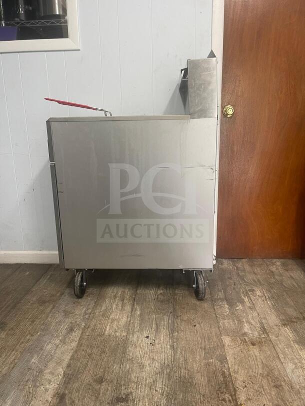 CITY COOKING CCF-4 NAT Gv deep fryer, 4-tube, 120000 BTU, stainless steel, on casters, side view, used condition.