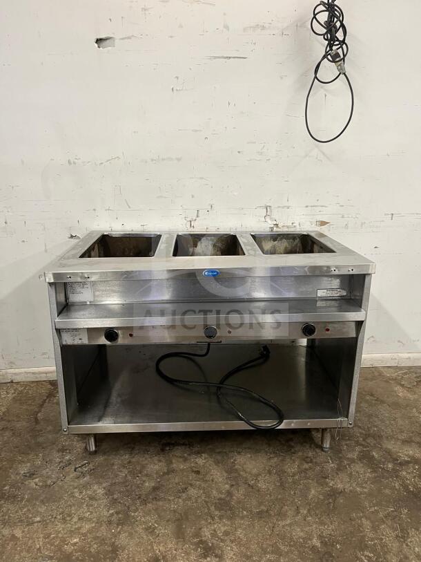 RANDELL 3513-120 48" electric hot food table, 3 top openings, stainless steel, good condition, visible power cord, control knobs.