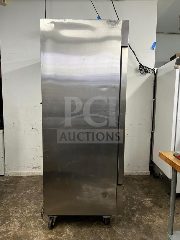Arctic Air AF49 reach-in freezer, 2 solid doors, stainless steel exterior, on casters, minor dents, model AF49.