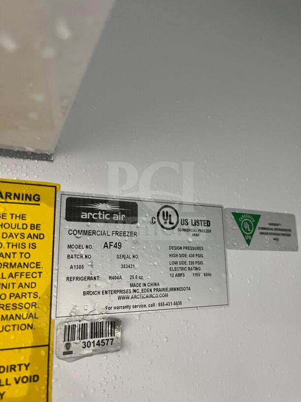 Arctic Air AF49 reach-in freezer, 2 solid doors, stainless exterior, with model and UL certification labels visible.