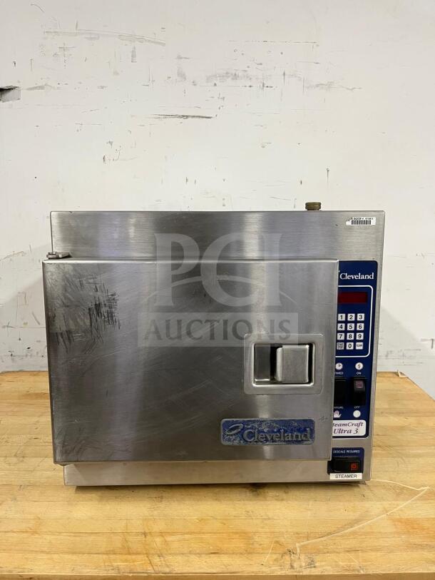 Cleveland 21CET8 Steamcraft steamer, stainless steel, 3-pan capacity, countertop model, visible wear, 208v/1ph.