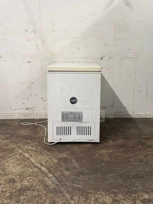 MAGIC CHEF deep freezer, white, front view, model: deep freezer. Visible power cord, labels, and brand logo. Appears in used condition.