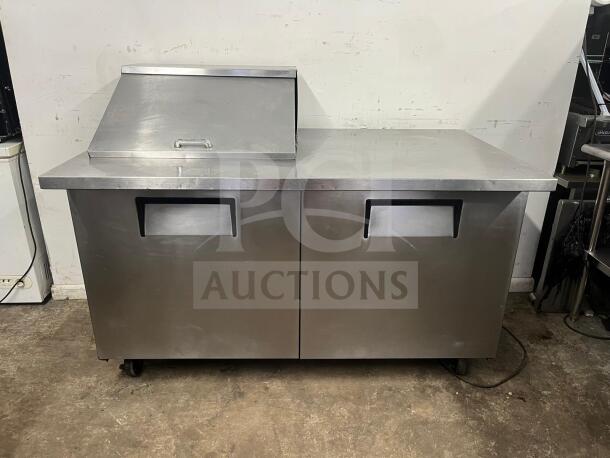 TRUE TSSU-60-12M-B-HC 60" 2 Door Mega Top Sandwich Prep Table with 12 pans, stainless steel, used condition.