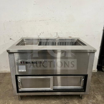 Stainless steel prep table with integrated salad bar by PREP TABLE. Features visible control panel. Excellent condition.