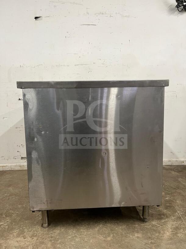 Stainless steel prep table with salad bar, PREP TABLE make, commercial use, good condition, sturdy legs.