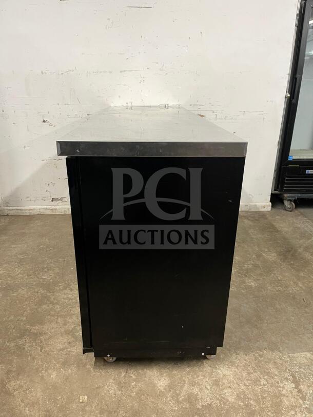 Dukers Back Bar Beverage Cooler DBB72, black exterior, stainless steel top, excellent condition, model DBB72.