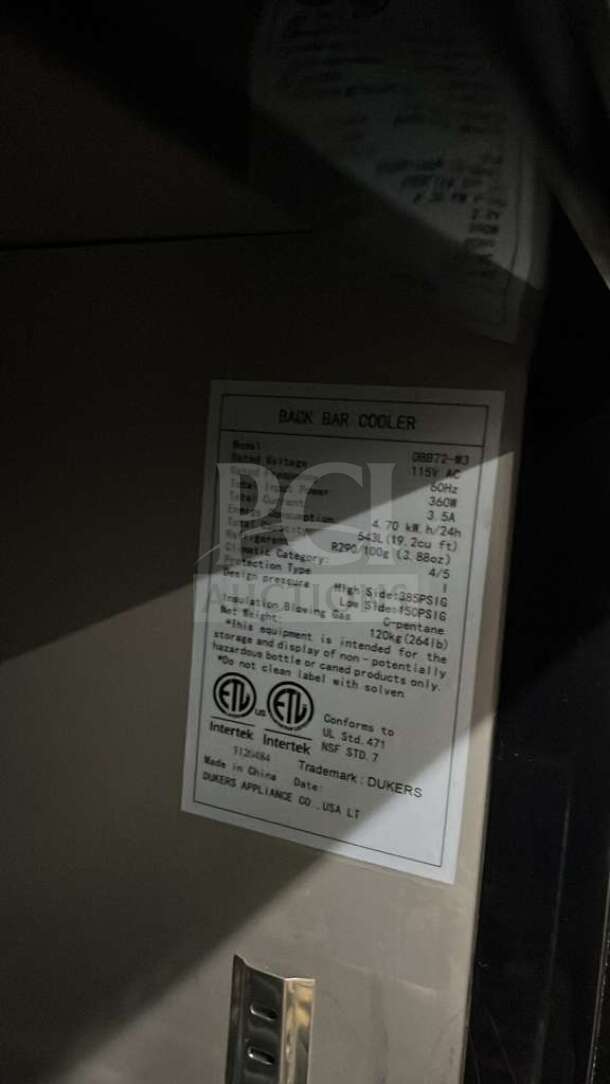Dukers Back Bar Beverage Cooler Model DBB72 label, showing specifications and certifications.