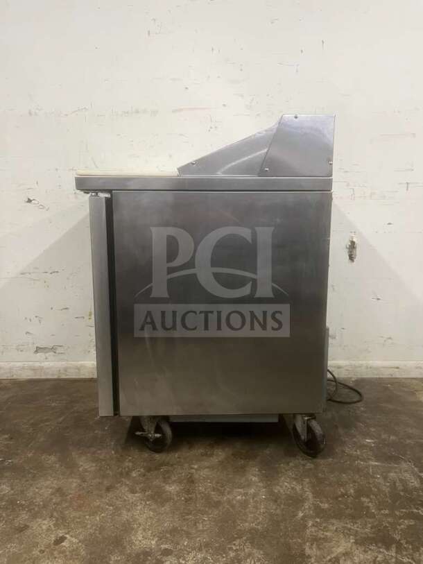 True TSSU-27-08-HC refrigerated sandwich prep table, stainless steel, right hinged door, on casters, used condition.