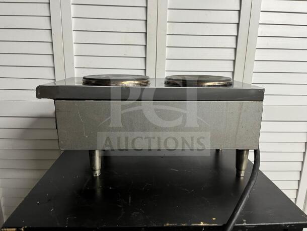 Starmax 602HF 12" electric hot plate with dual burners. Stainless steel exterior; used condition with visible wear.