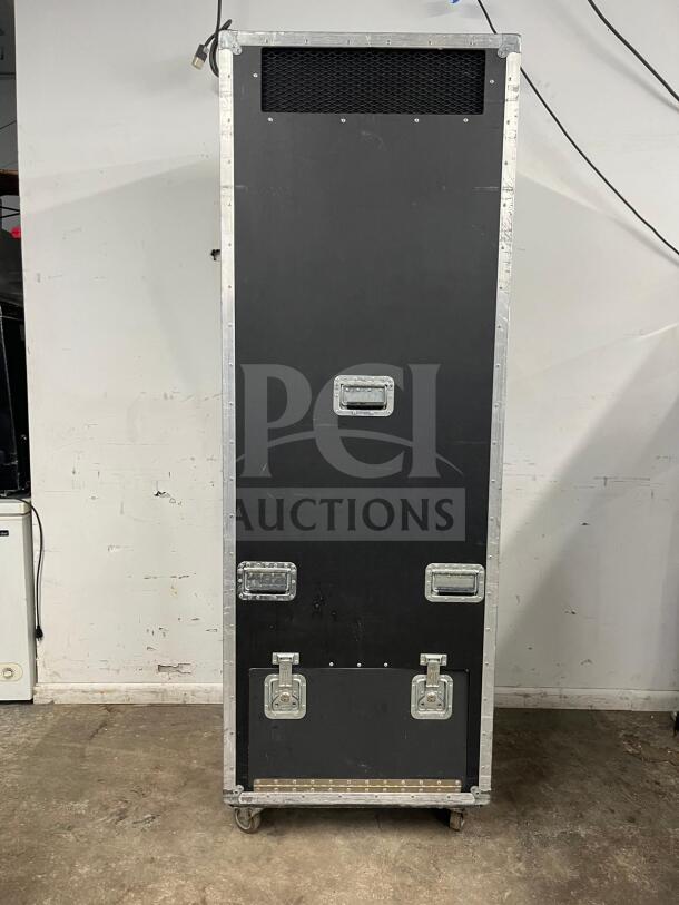TRUE GDM-19T-LD 27" black refrigerated merchandiser with LED lighting, in travel case, shown closed.