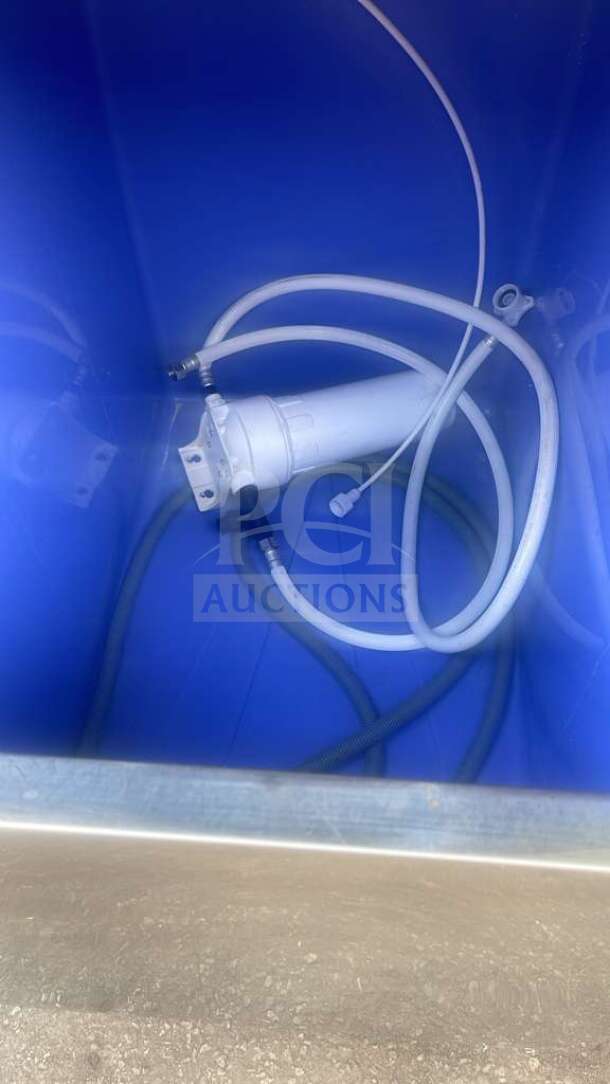 HLH350 Commercial Ice Machine, stainless steel, model hlh350, parts and hoses shown inside blue interior, used condition.