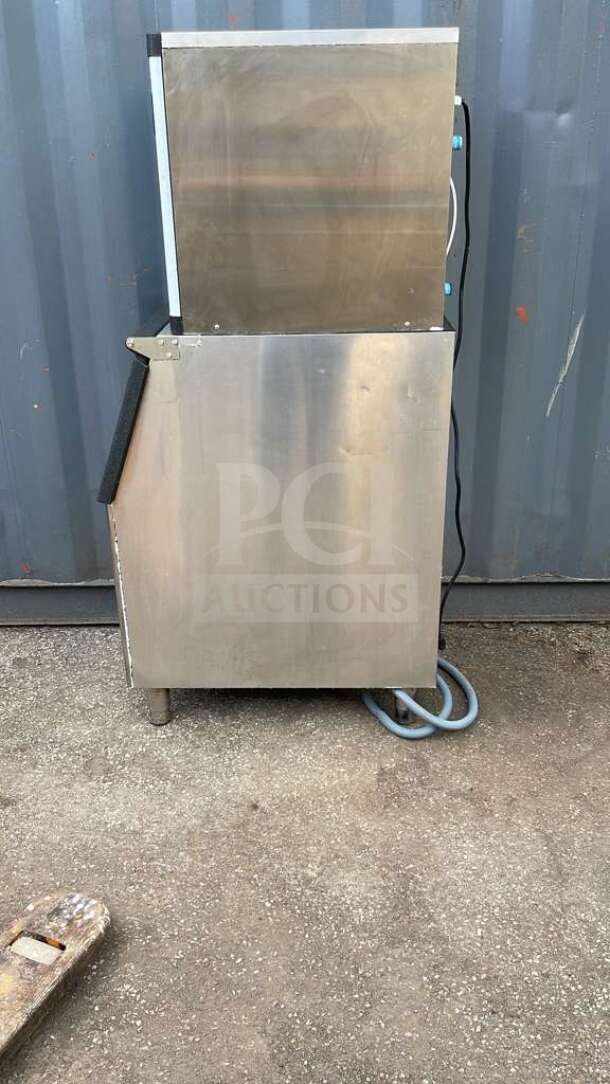 HLH350 commercial ice machine in stainless steel, model HLH350, features visible wear, power cables attached.