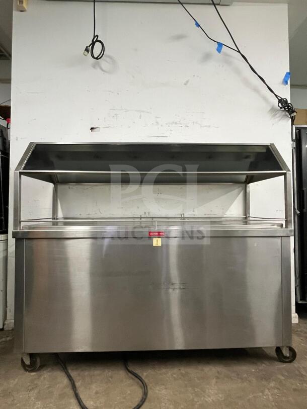 Gaylord stainless steel buffet table in amazing condition, with steam functionality and "CAUTION - HOT" label.