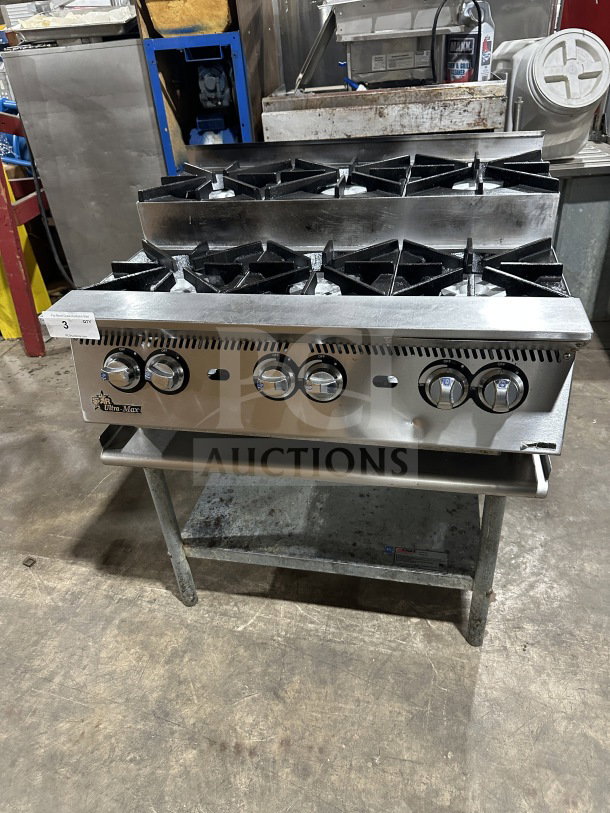UltraMax 6-burner gas countertop hot plate range in stainless steel with open equipment stand, very good condition.