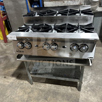 UltraMax 6-burner gas countertop hot plate range in stainless steel with open equipment stand, very good condition.