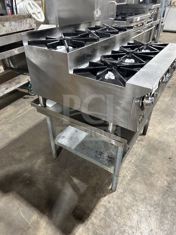 UltraMax commercial stainless steel 6-burner gas hot plate range on stand, excellent condition, sturdy, industrial use.