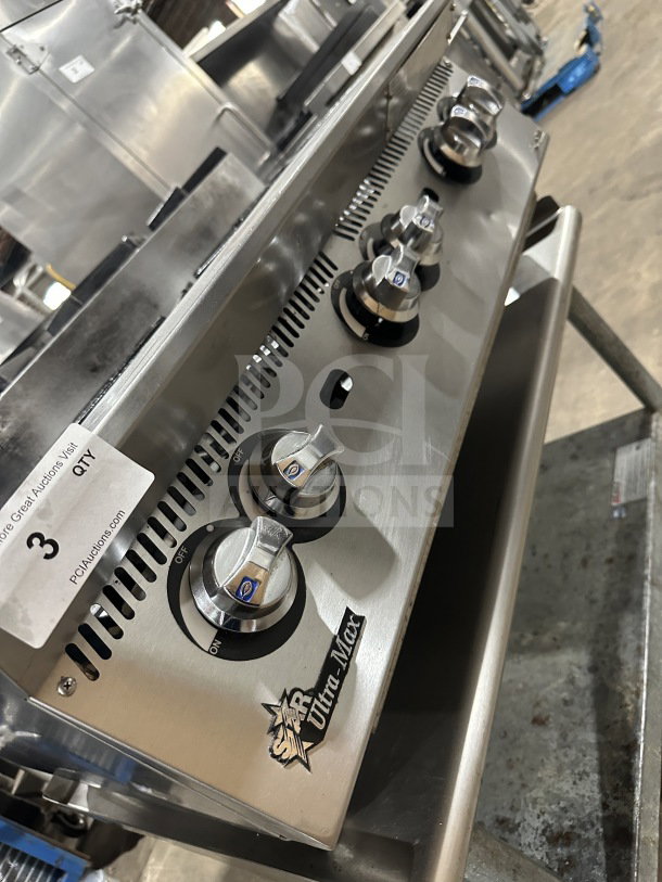 UltraMax commercial stainless steel 6-burner gas countertop hot plate range on an open equipment stand, excellent condition.