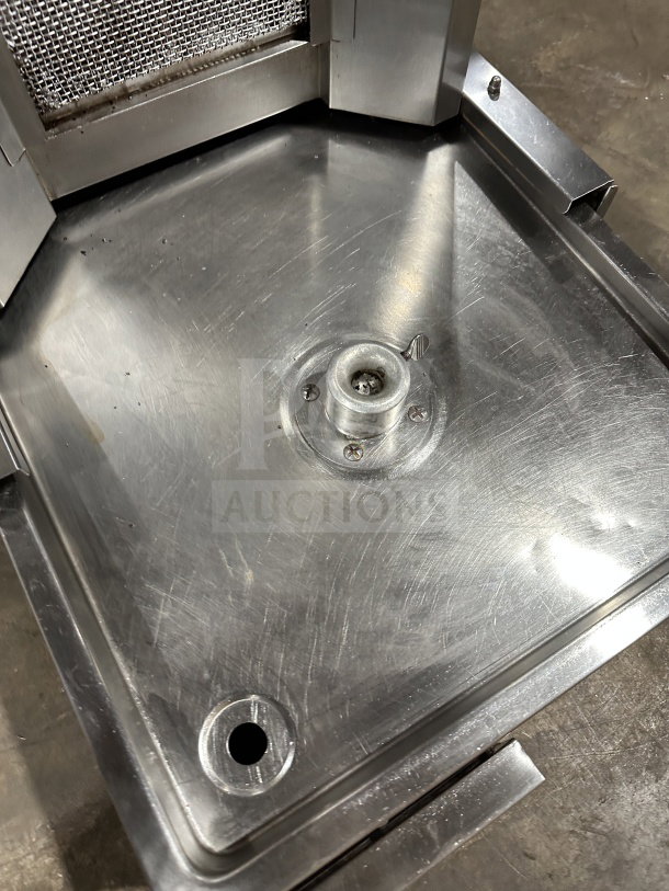 Sheffcat stainless steel 5-burner vertical broiler for commercial use. Features gas power, sturdy construction, and metal grill.