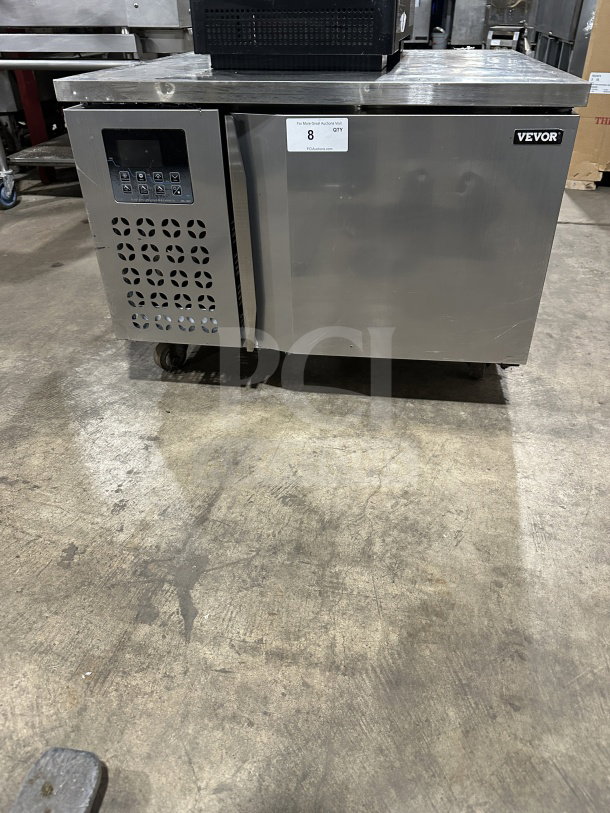 VEVOR stainless steel countertop blast chiller and flash freezer on casters, 110/115V. Features control panel and VEVOR label.
