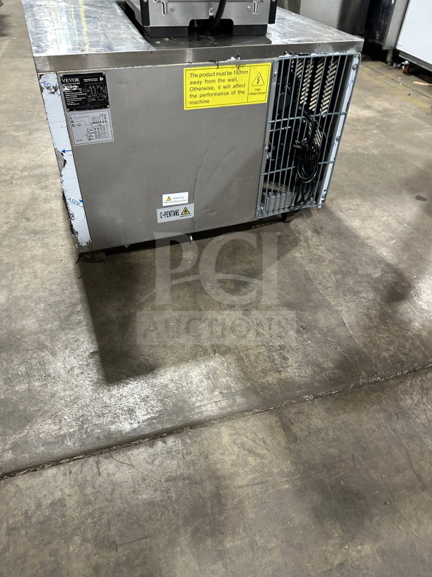 VEVOR stainless steel countertop blast chiller and flash freezer on casters, 110/115V. Features safety and use warnings.