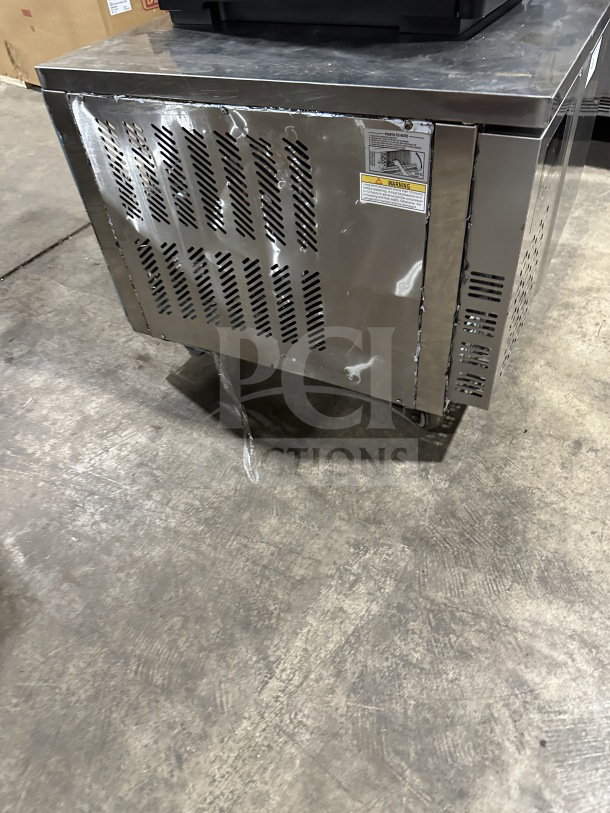 VEVOR stainless steel countertop electric blast chiller and flash freezer on casters, 110/115V, used, with exterior dent.